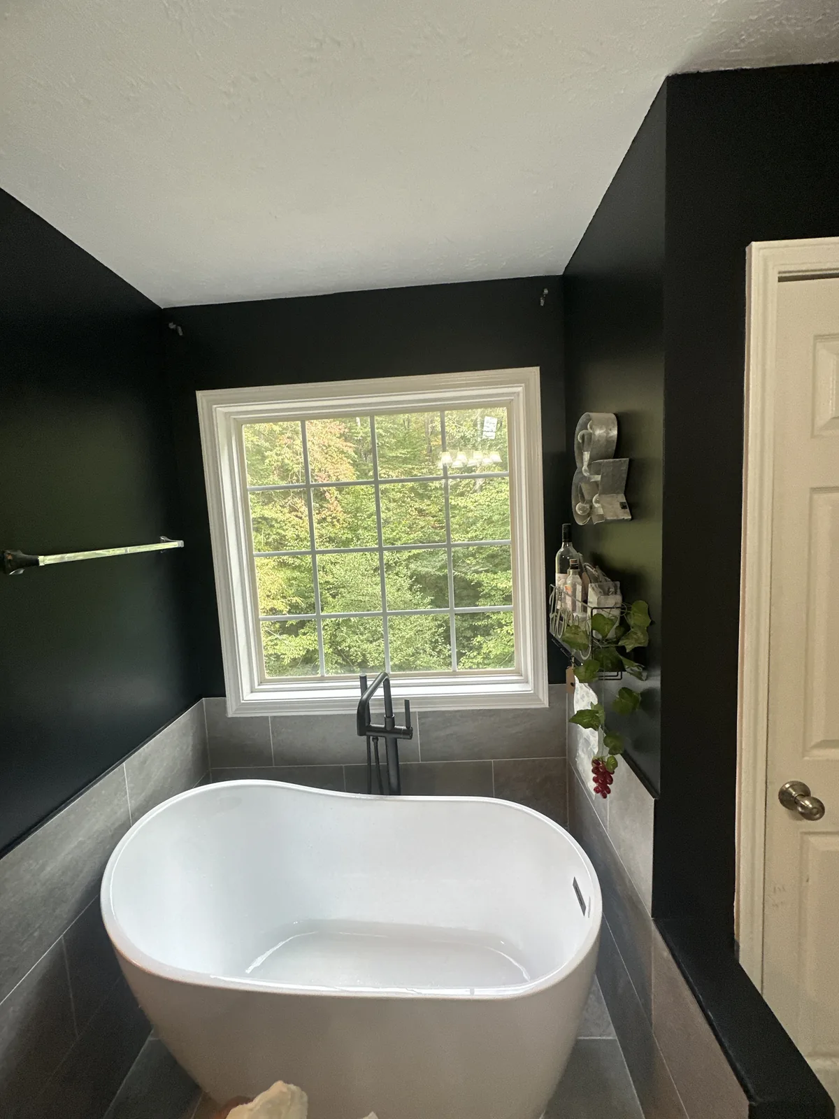 The freestanding tub set under the window in Tallapoosa