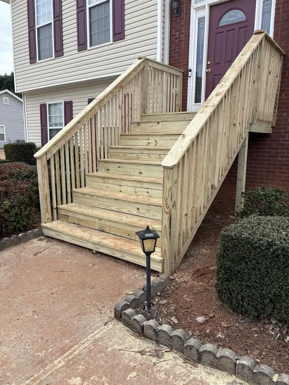 The rebuilt porch stair and landing in Winder