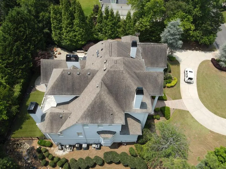 The side of the house from the air before the tear off